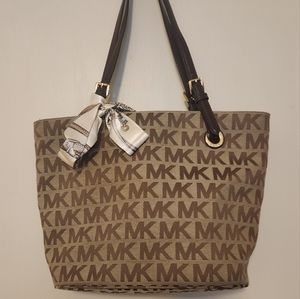 Tan and brown Coach purse large